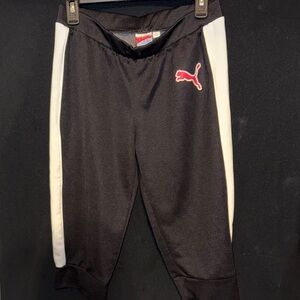 Puma Woman’s Black Joggers with White Stripes